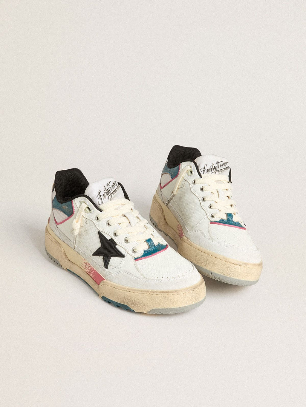 Men's Forty2 with black star and silver foiled leather heel tab