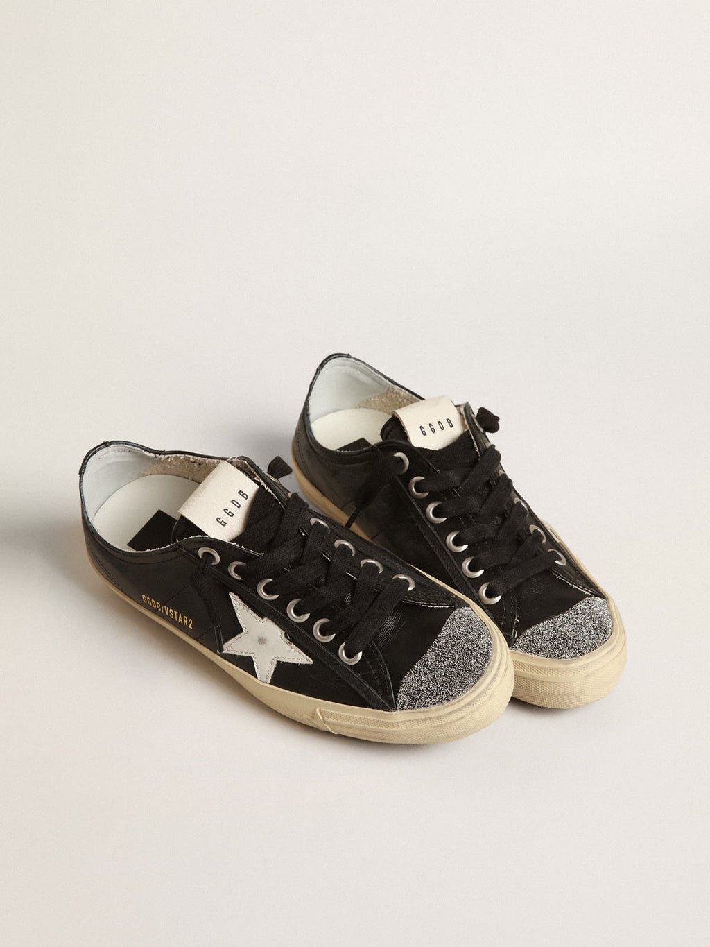 V-Star in nappa nera con stella bianca e punta in cristalli Swarovski