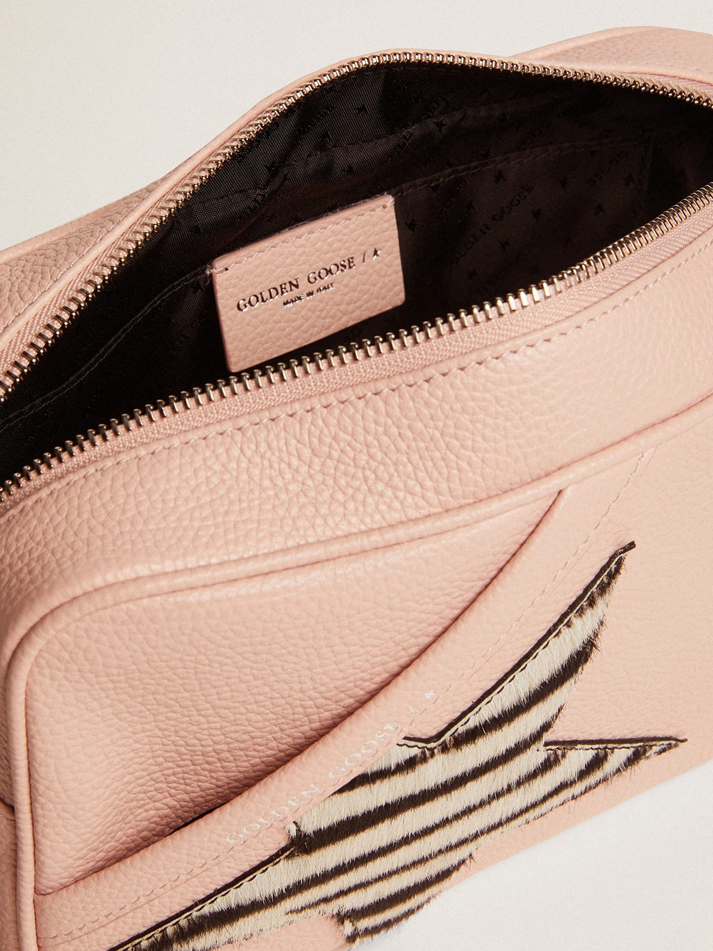 Borsa Star Bag in pelle rosa con stella in cavallino zebrato