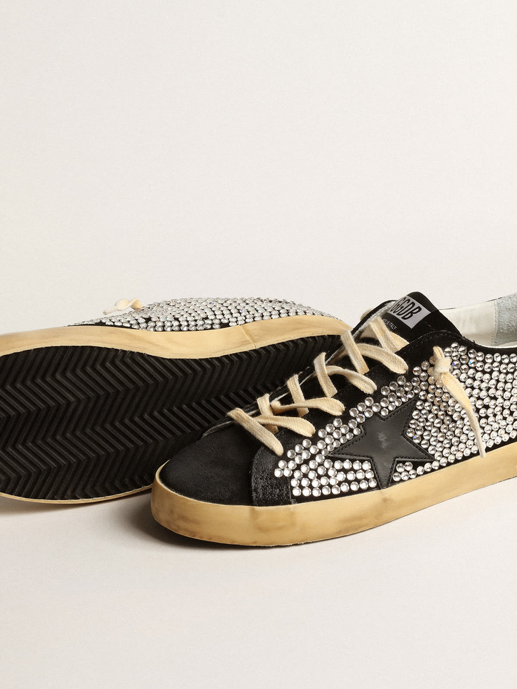 Super-Star LTD con cristalli Swarovski e stella in pelle nera