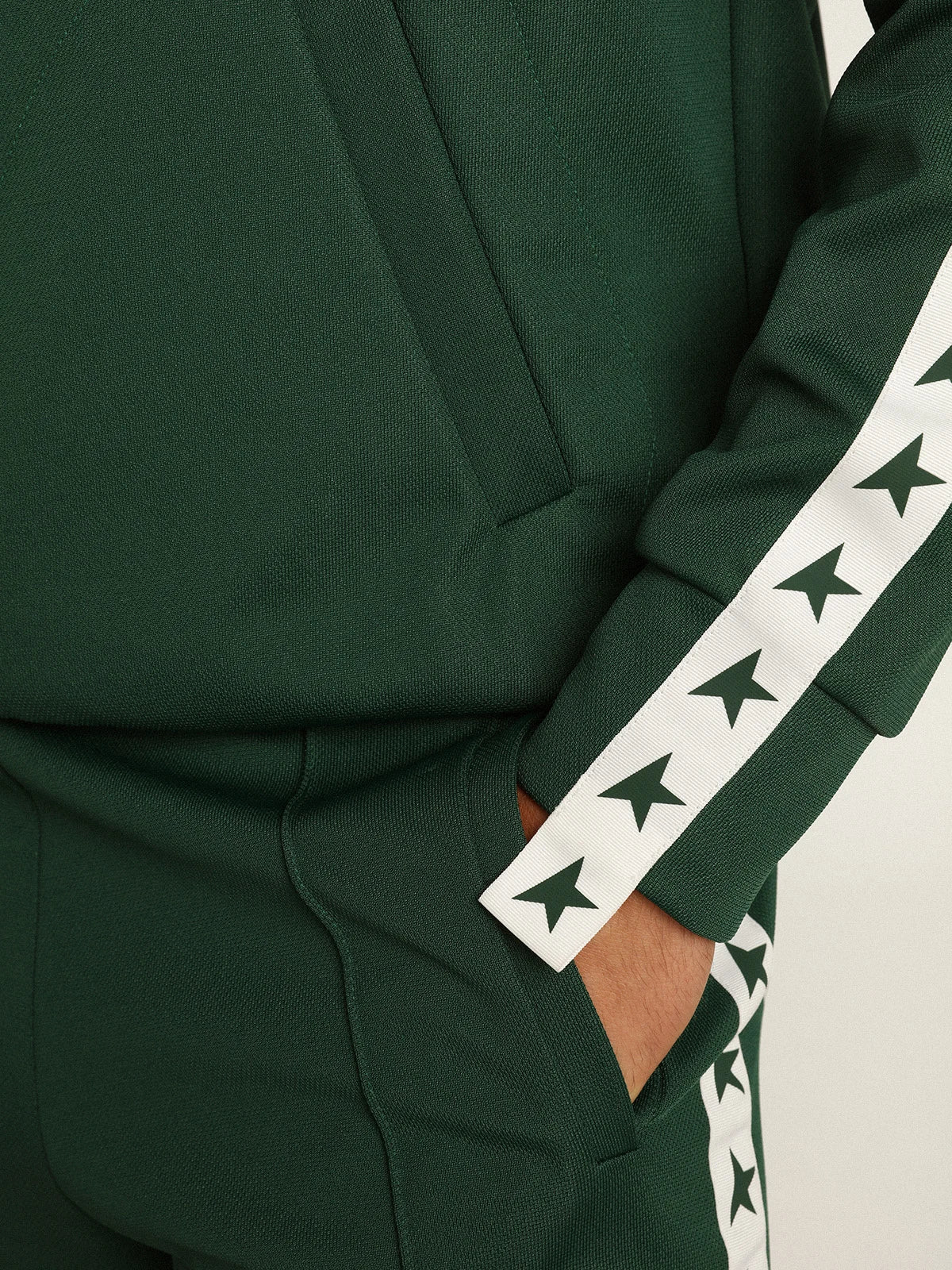 Felpa con zip da uomo di colore verde con nastro bianco e stelle a contrasto