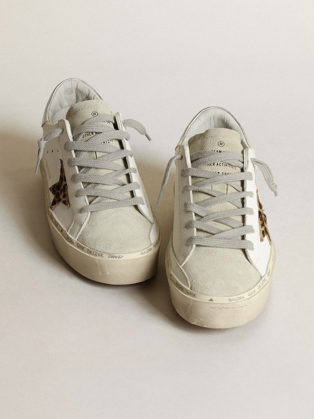 Sneaker Hi Star con stella in cavallino leopardato e talloncino in pelle laminata color argento