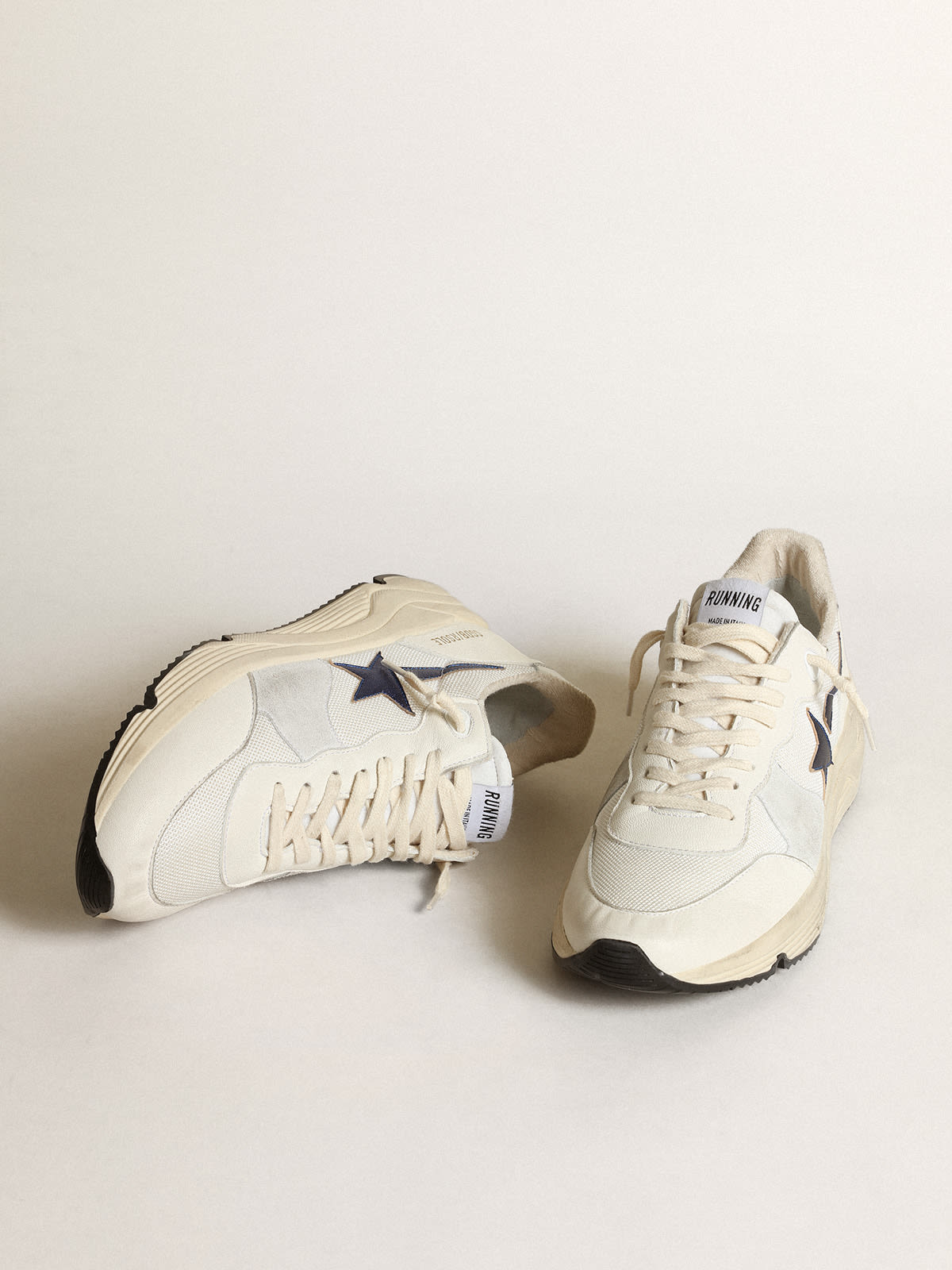 Running Sole in rete e nappa bianche con stella blu