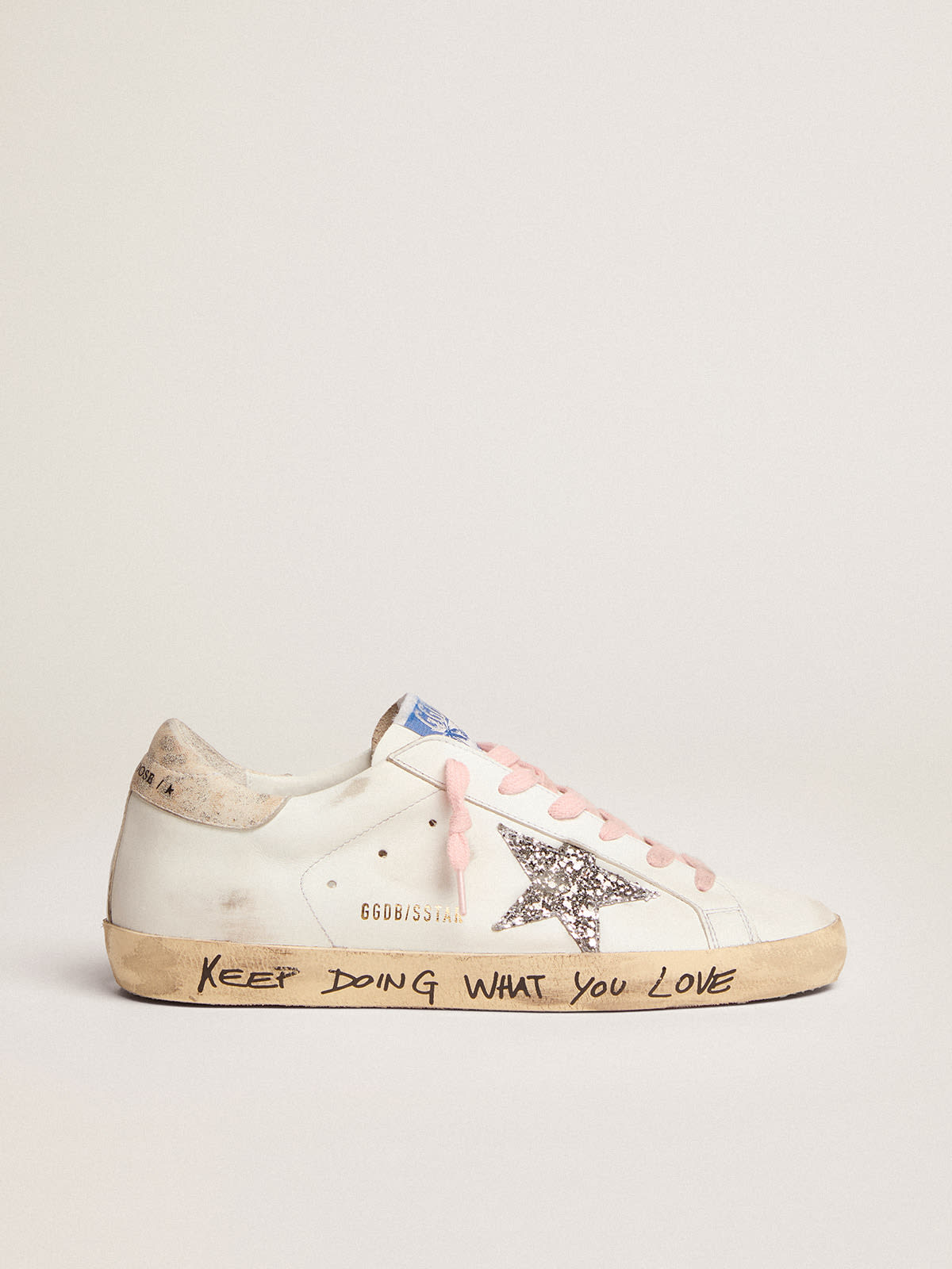 Sneaker Super-Star con stella in glitter argento e talloncino in pelle con stampa leopardata