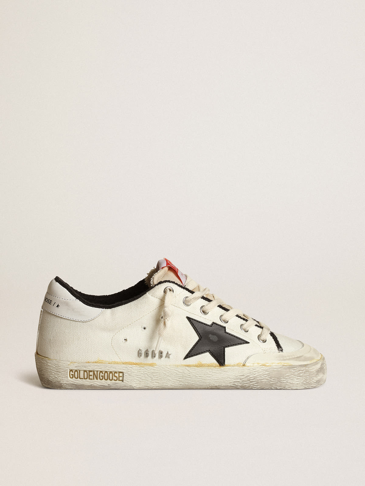 Sneaker Super-Star uomo LTD in canvas beige con stella in pelle nera e talloncino in pelle bianca