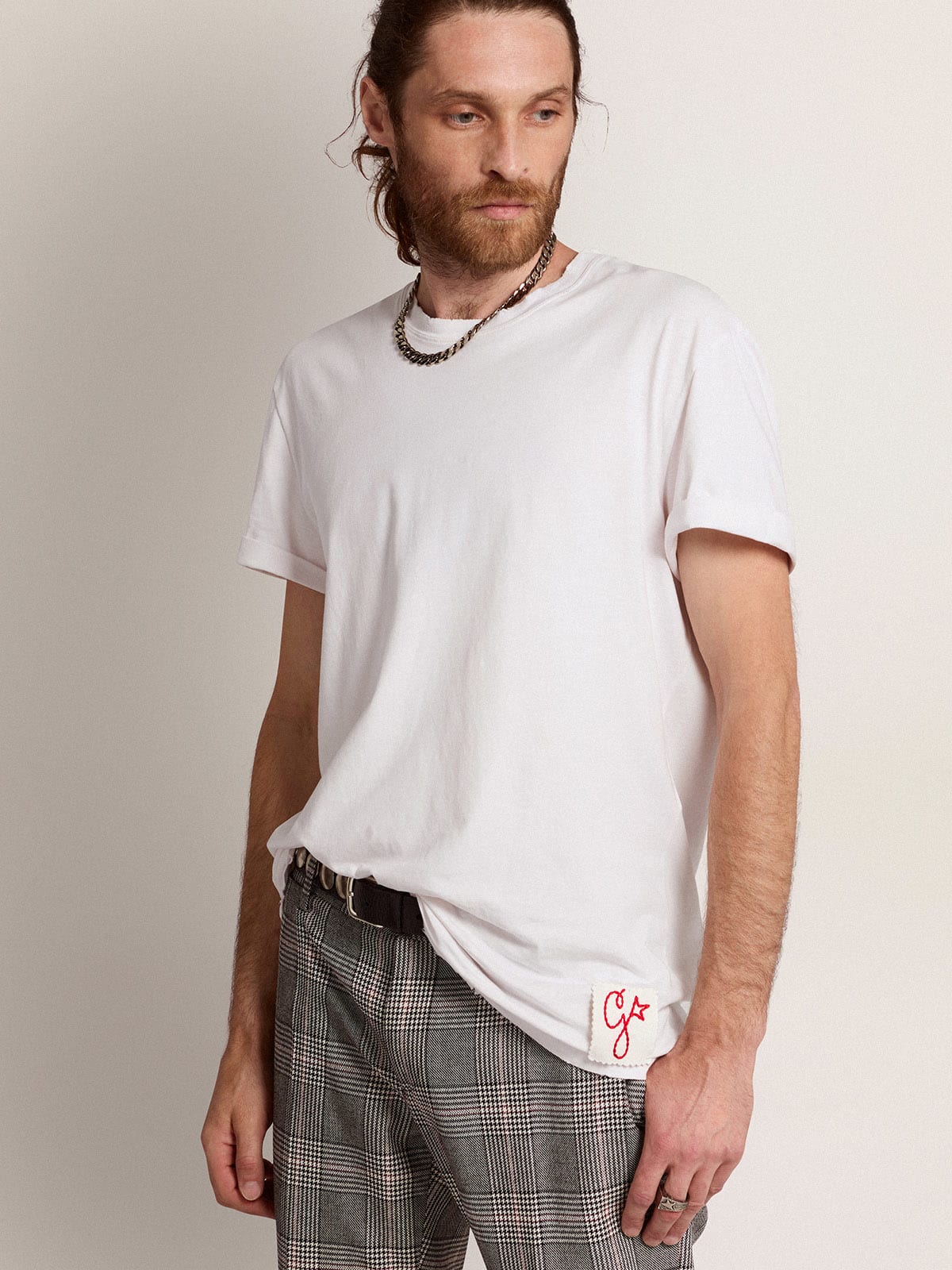 T-shirt Collezione Golden di colore bianco dal trattamento distressed