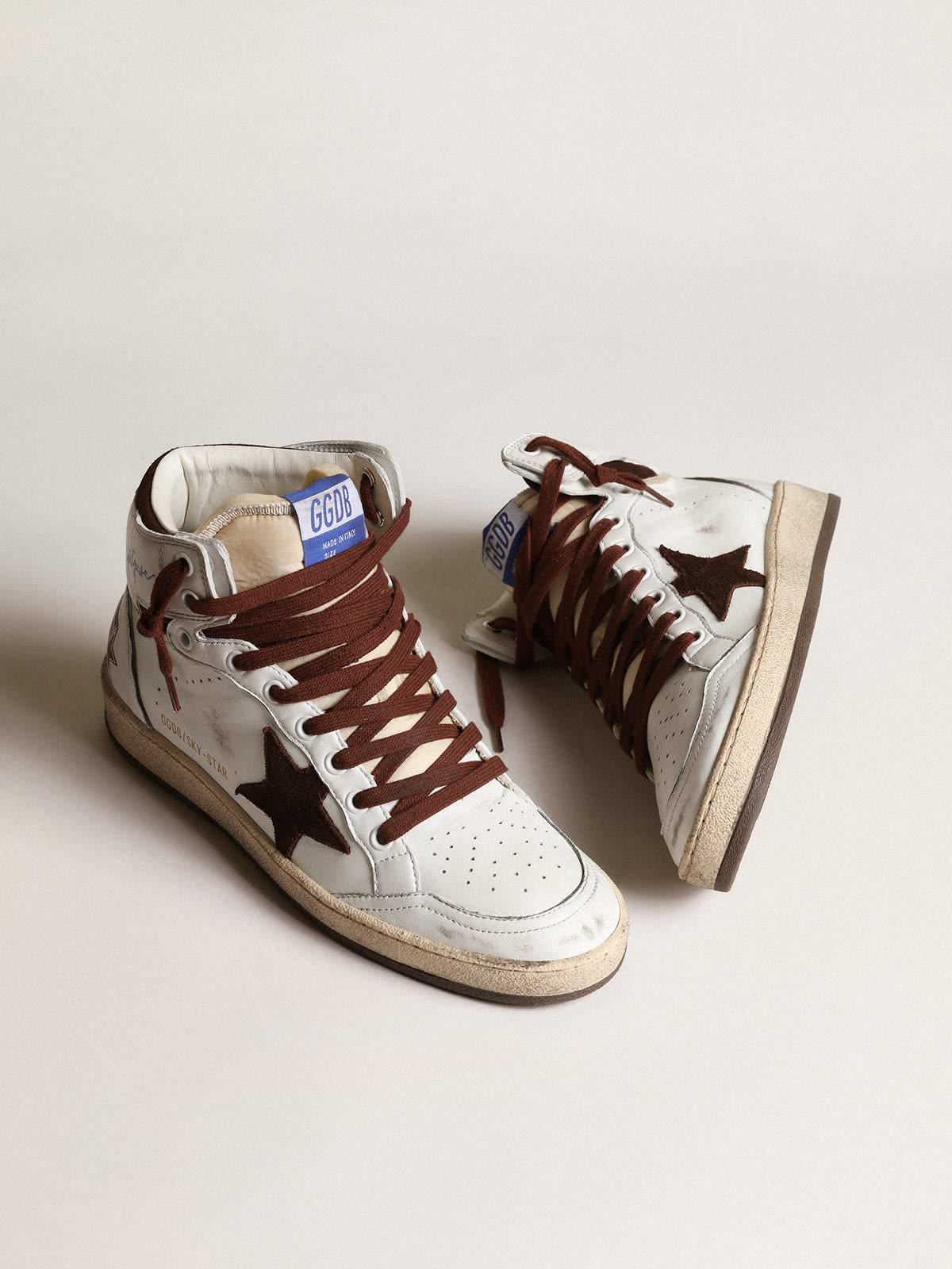 Sky-Star Donna in nappa bianca con stella in suede cioccolato