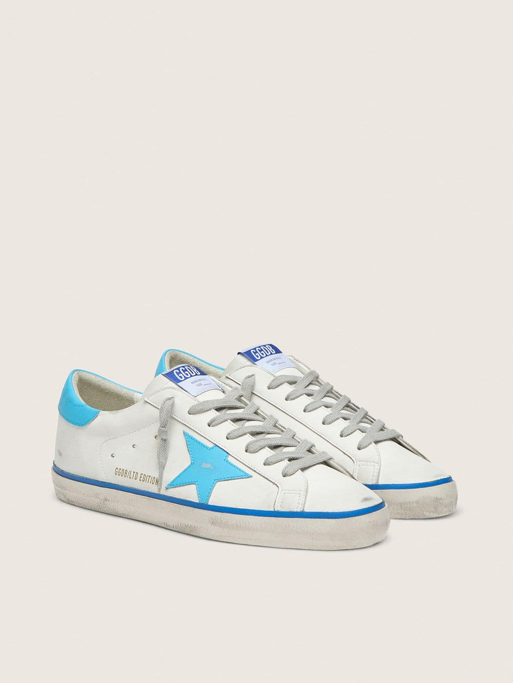 Men's Super-Star LTD in white leather with light blue leather star and heel tab