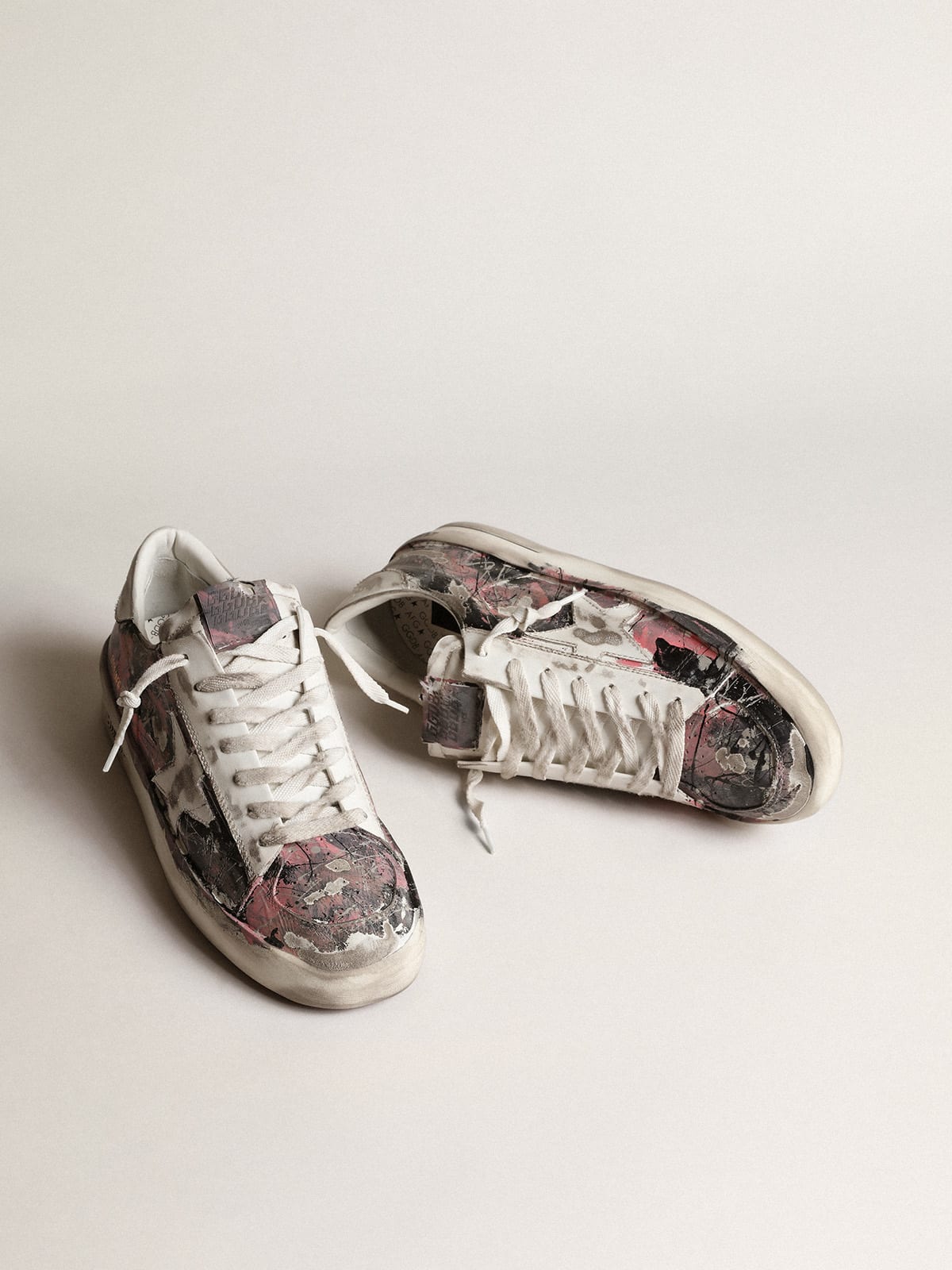 Stardan LAB uomo in pelle con schizzi di vernice multicolore all-over