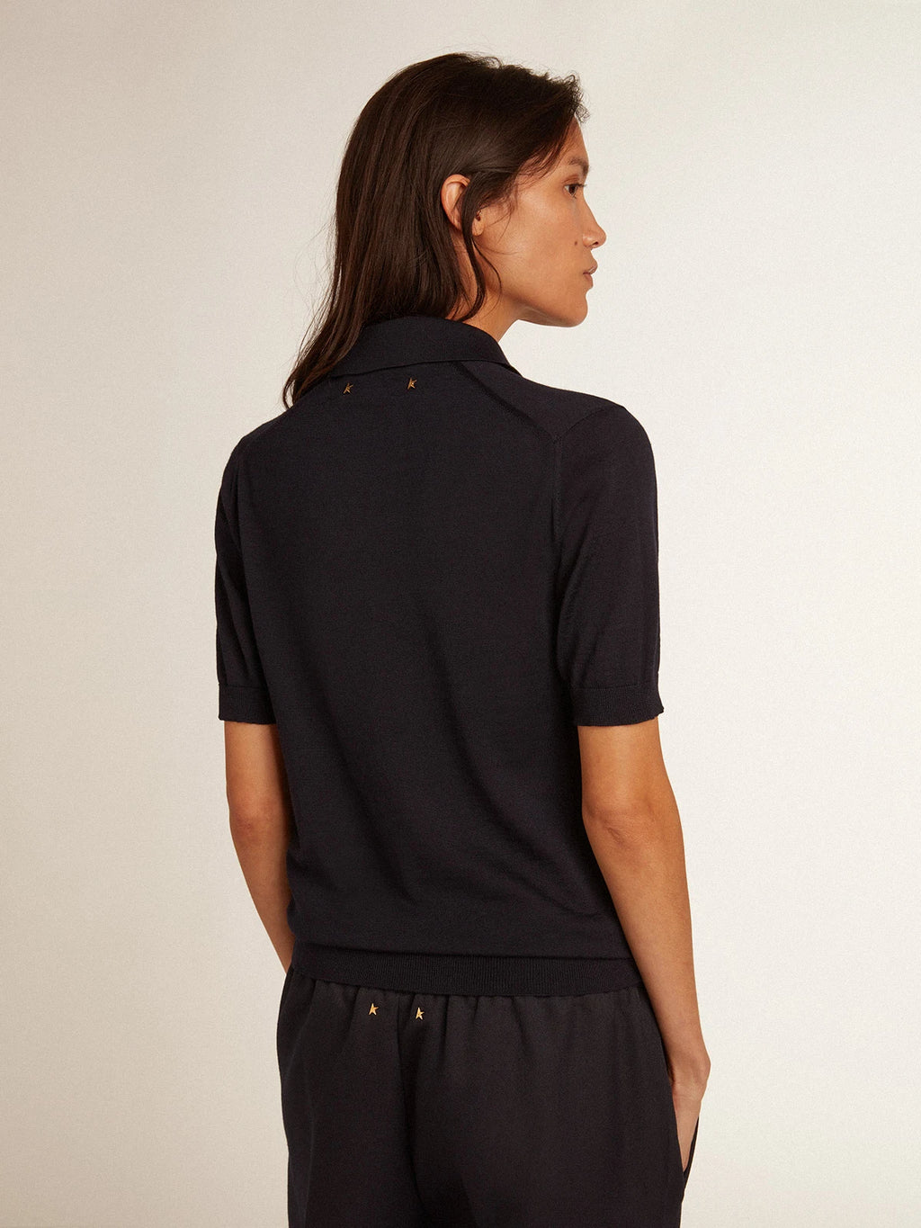 Polo da donna in lana merino di colore blu navy