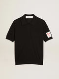 Polo da donna in lana merino di colore nero