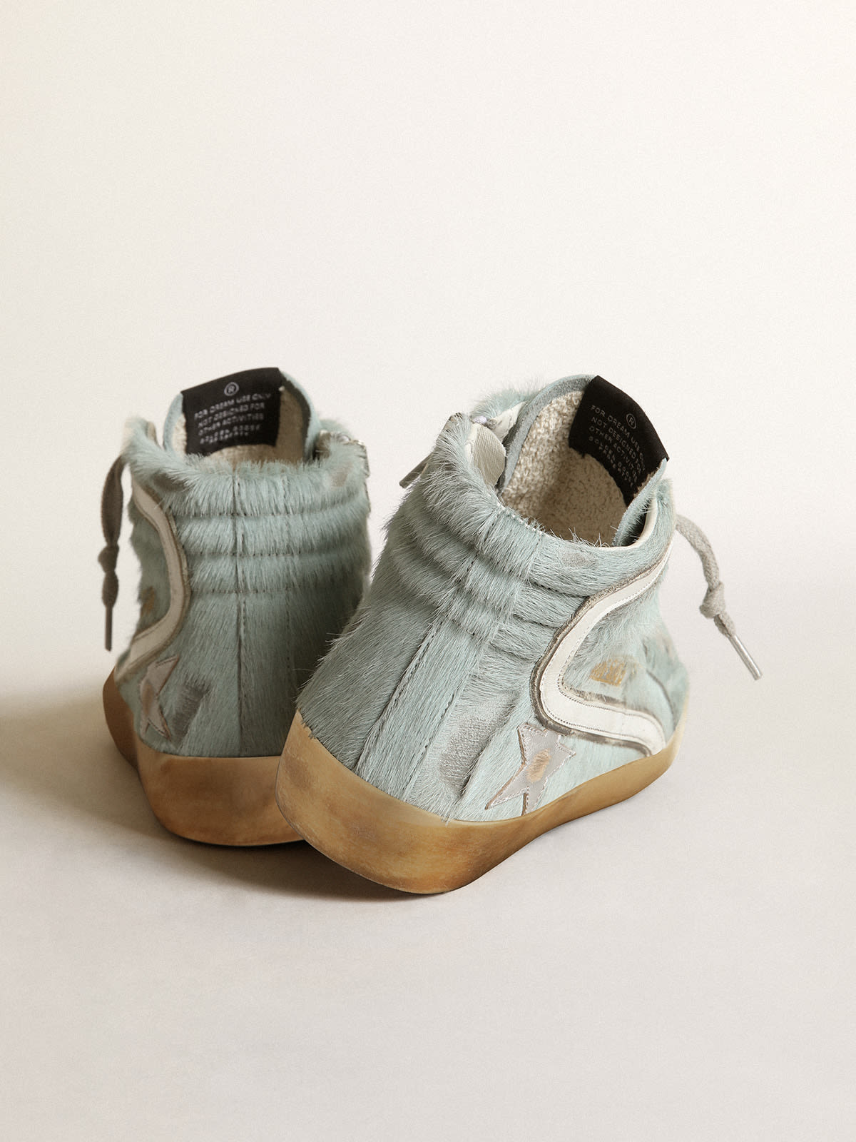 Sneaker Slide in cavallino color acquamarina con stella in pelle laminata color argento