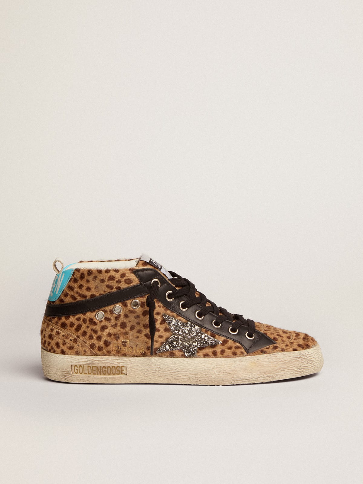 Sneaker Mid Star in cavallino con stampa animalier e stella in glitter argento