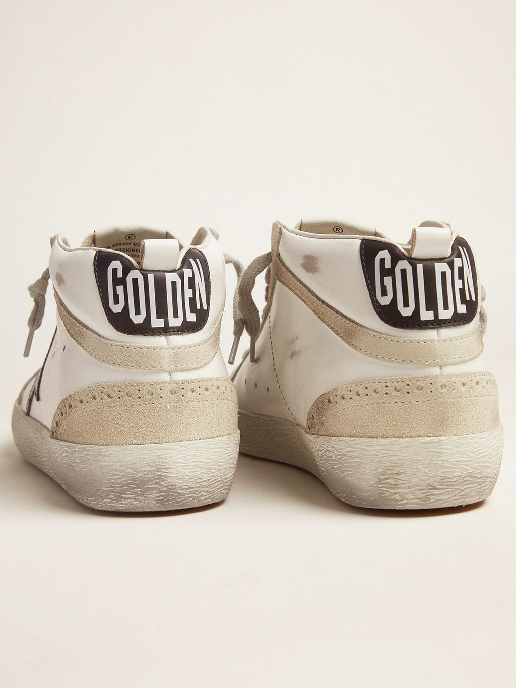 Sneakers Mid Star bianche e nere