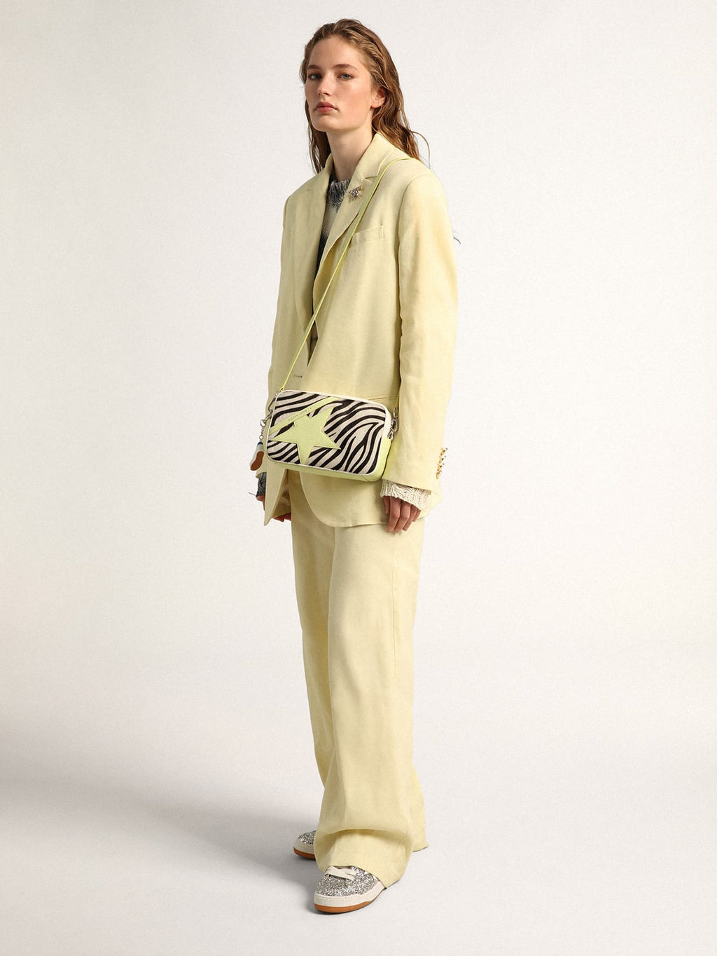 Borsa Star Bag in pelle martellata color bianco e lime con inserto in cavallino zebrato e stella in pelle color lime