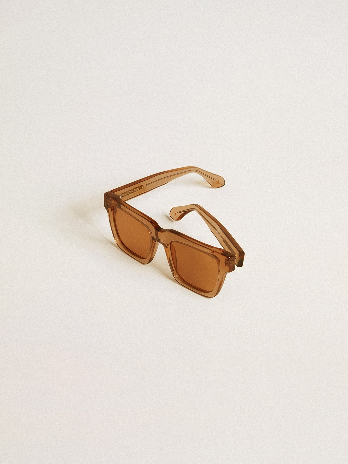 Jamie style square sunglasses with honey-colored frame and lenses