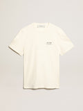 T-shirt di colore bianco dal trattamento distressed con scritta