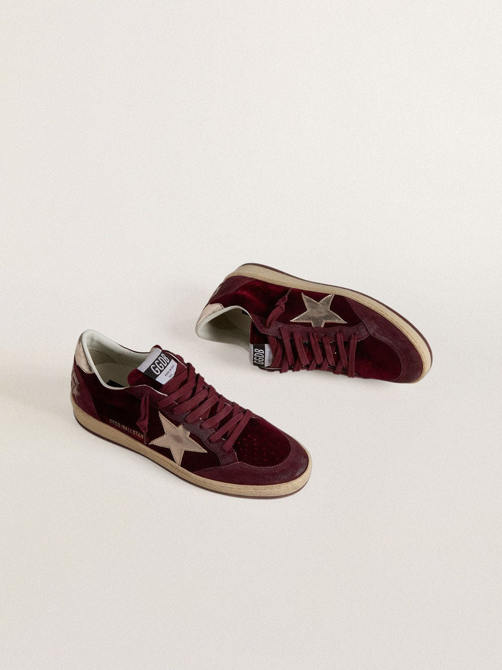 Women's Ball Star in burgundy velvet with gold metallic leather star and heel tab