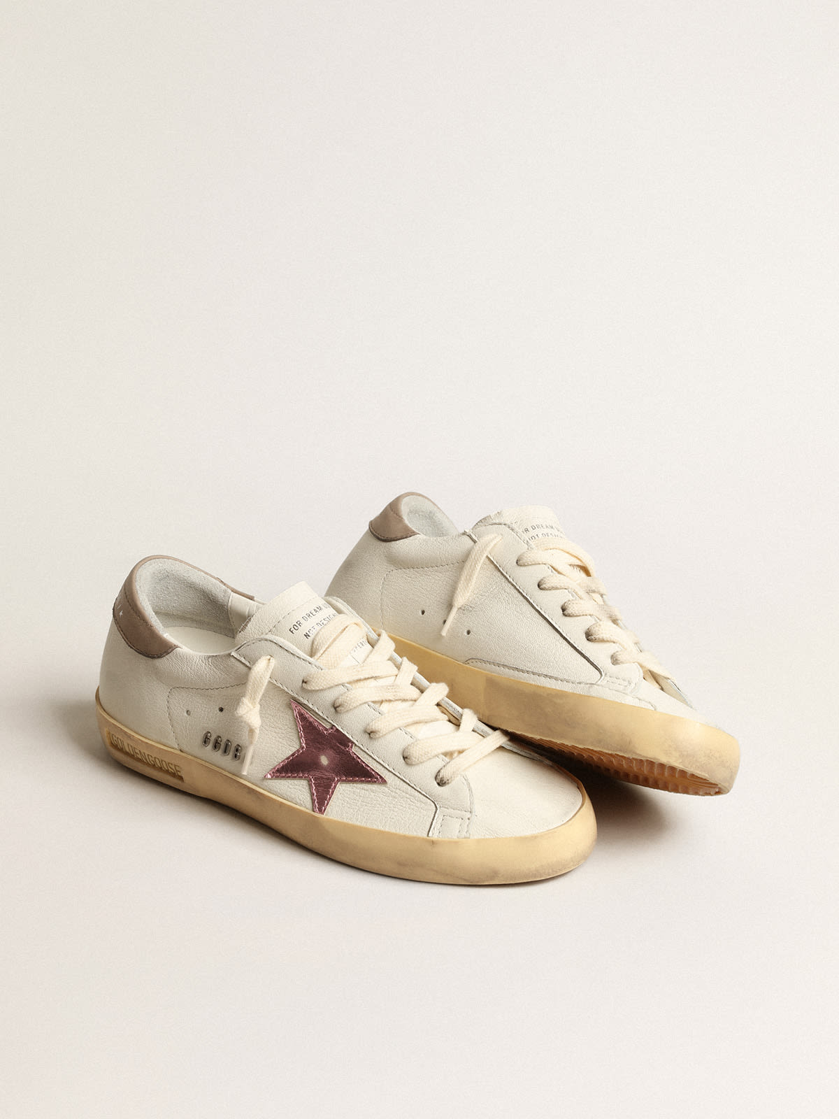 Super-Star in nappa bianca con stella in pelle laminata rosa