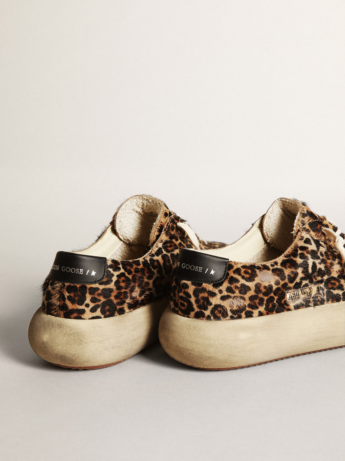 Scarpe Space-Star Uomo in cavallino leopardato con stella e talloncino in pelle nera