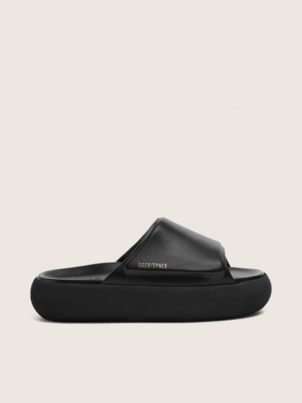 Women's Space-Star Slide slip-ons in black leather