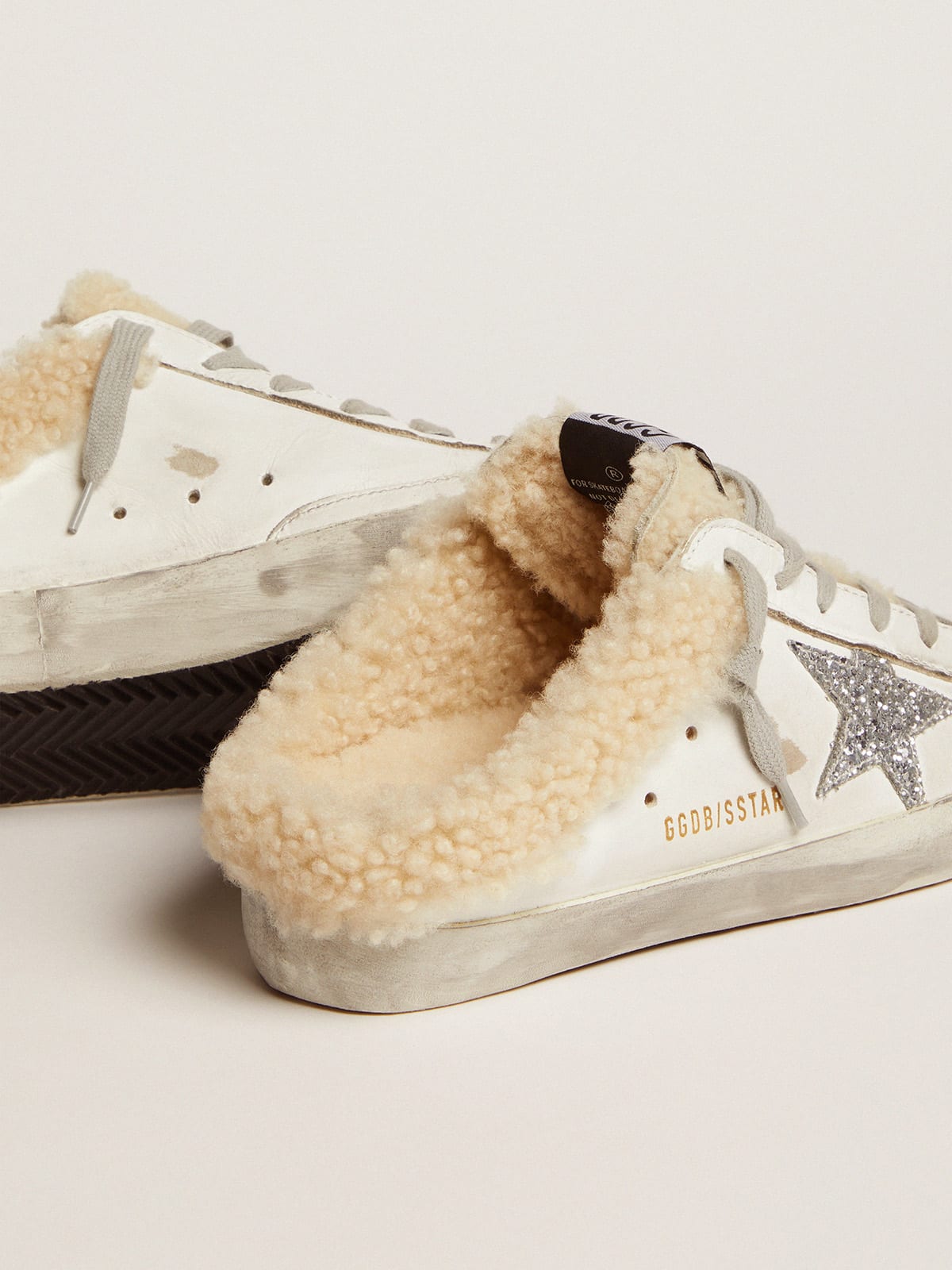 Super-Star Sabot in pelle bianca con stella in glitter argento e fodera in shearling