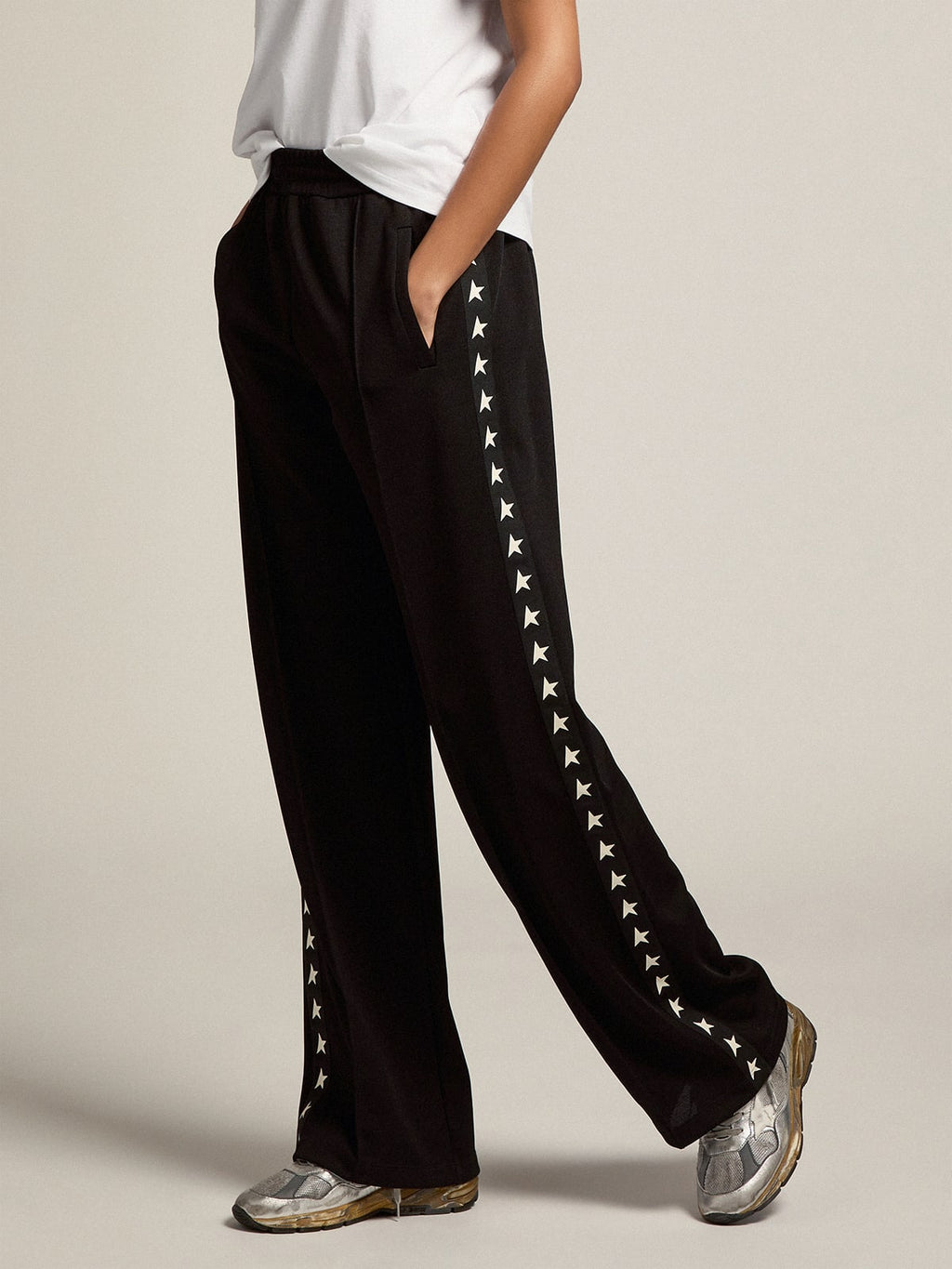 Pantalone jogging da donna di colore nero con stelle bianche sui lati