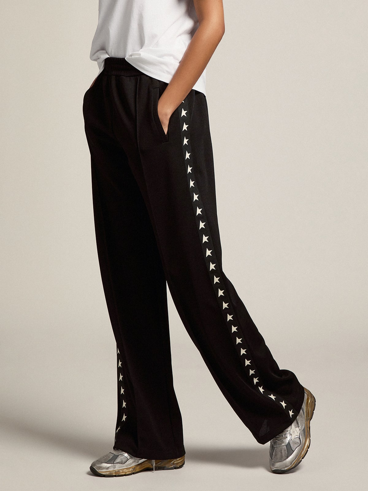 Pantalone jogging da donna di colore nero con stelle bianche sui lati