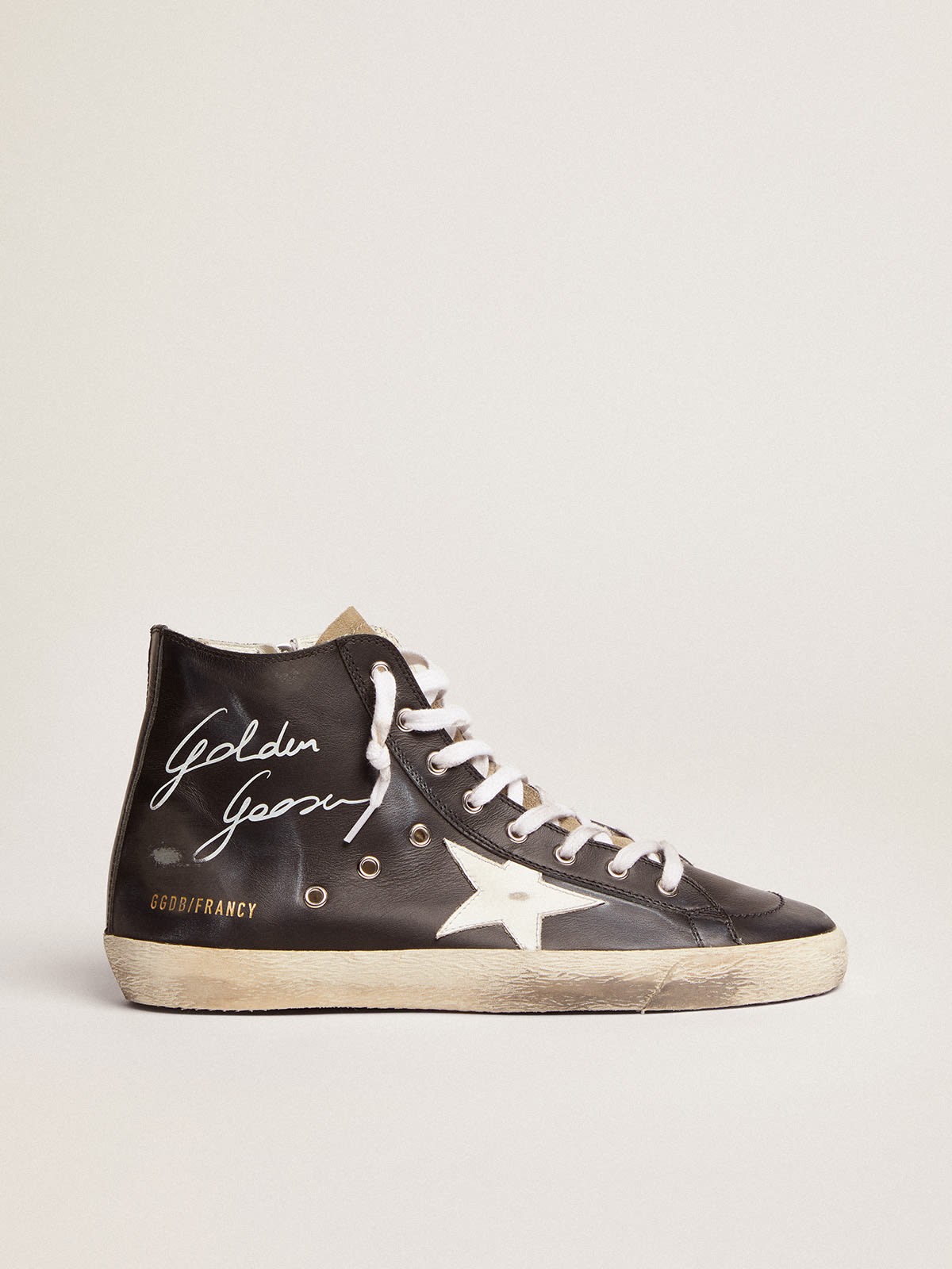 Sneaker Francy con tomaia in pelle nera e stella in pelle bianca