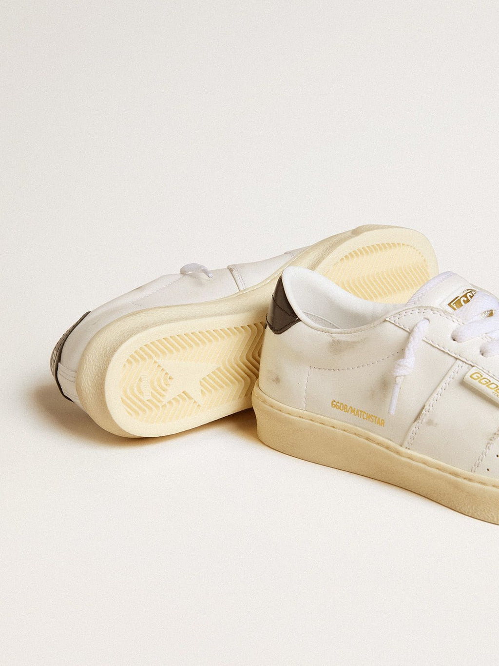 Women's Matchstar in white leather with dark blue leather heel tab