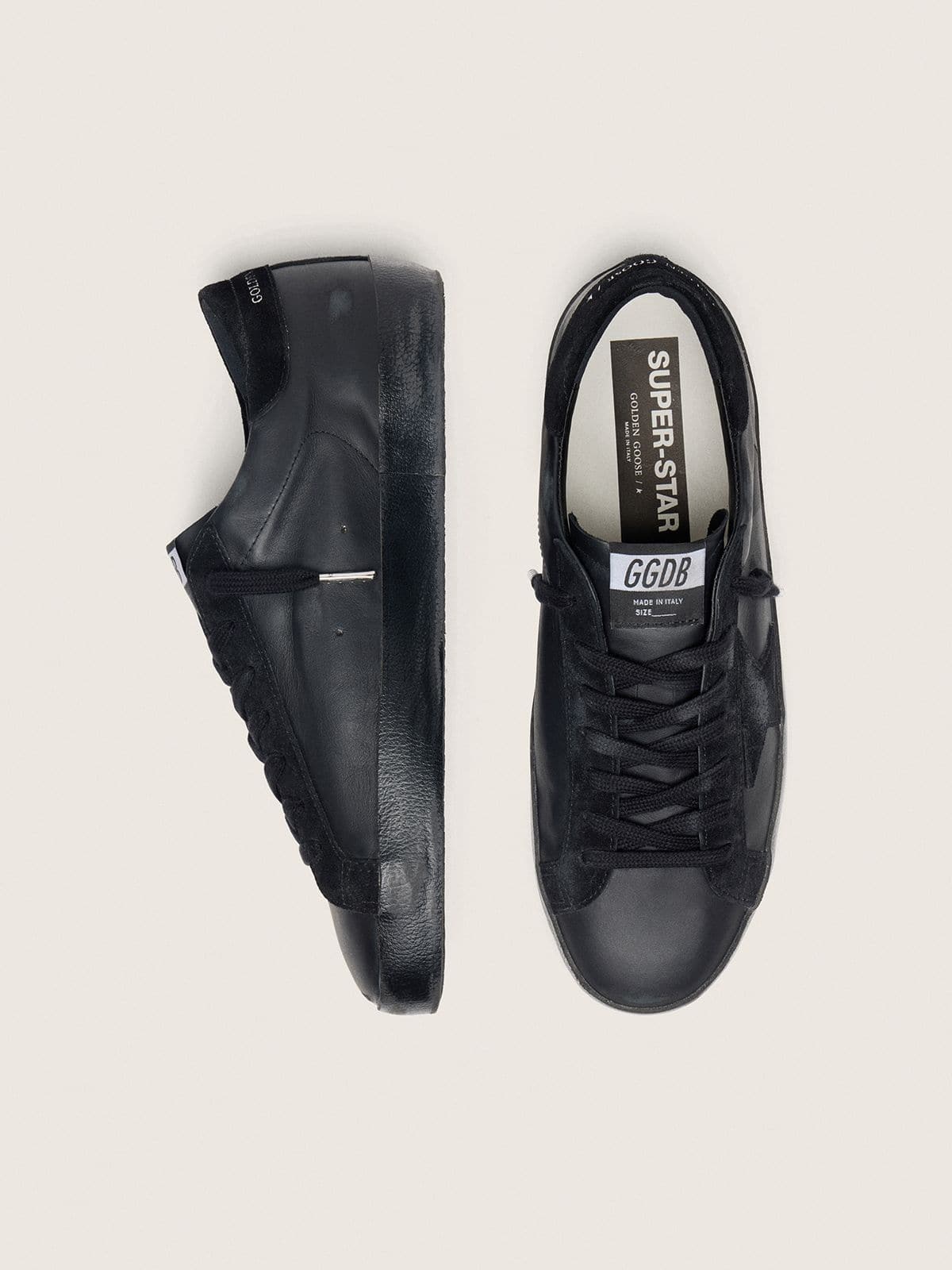 Men's Super-Star in black nappa with black suede star and heel tab