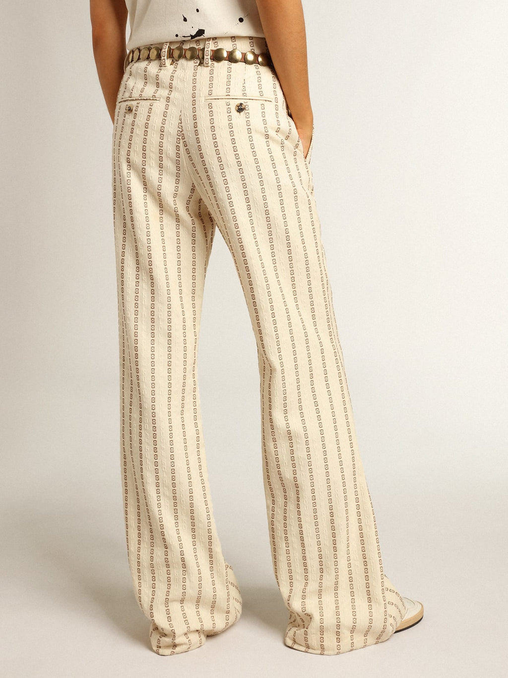 Pantalone in cotone color panna con motivo jacquard