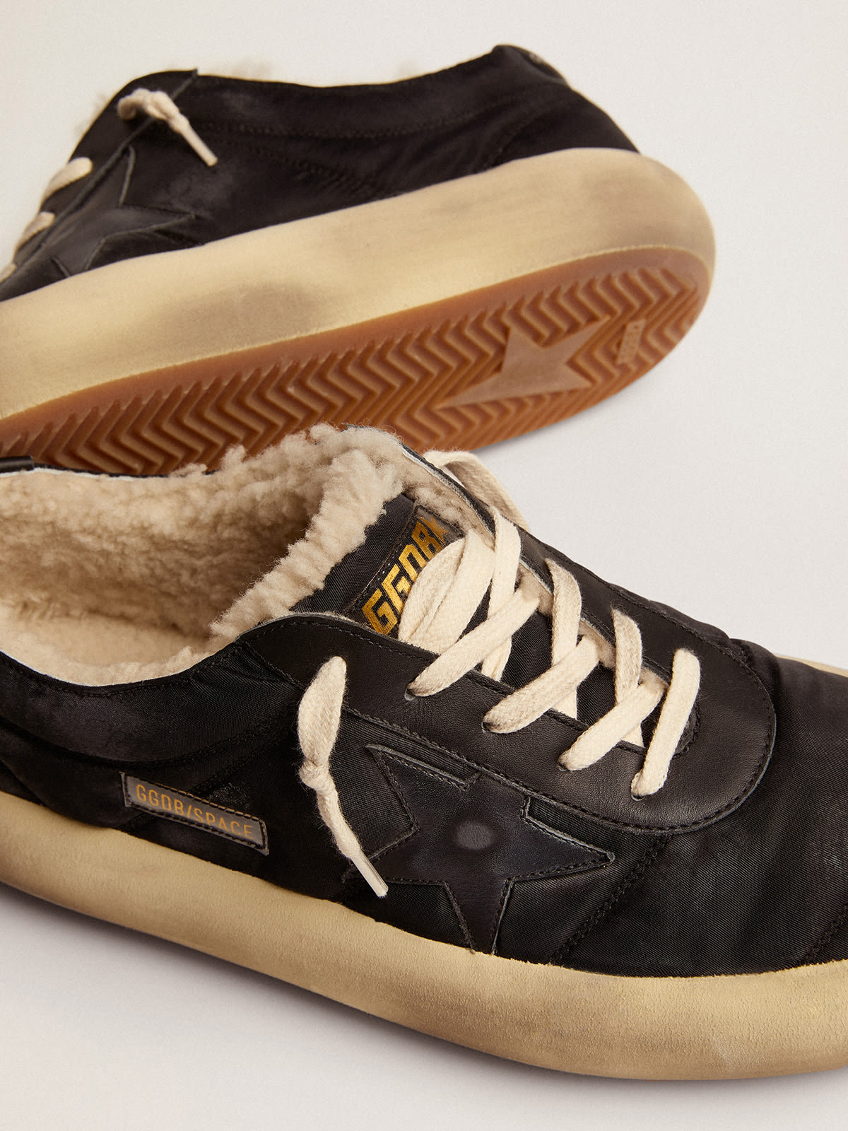 Space-Star Uomo in nylon nero trapuntato e fodera in shearling