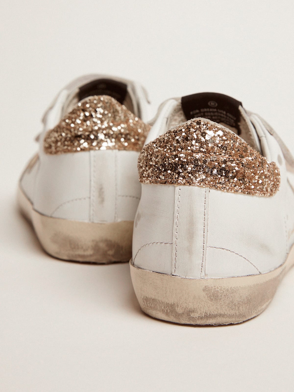 Old School con stella dorata in pelle laminata