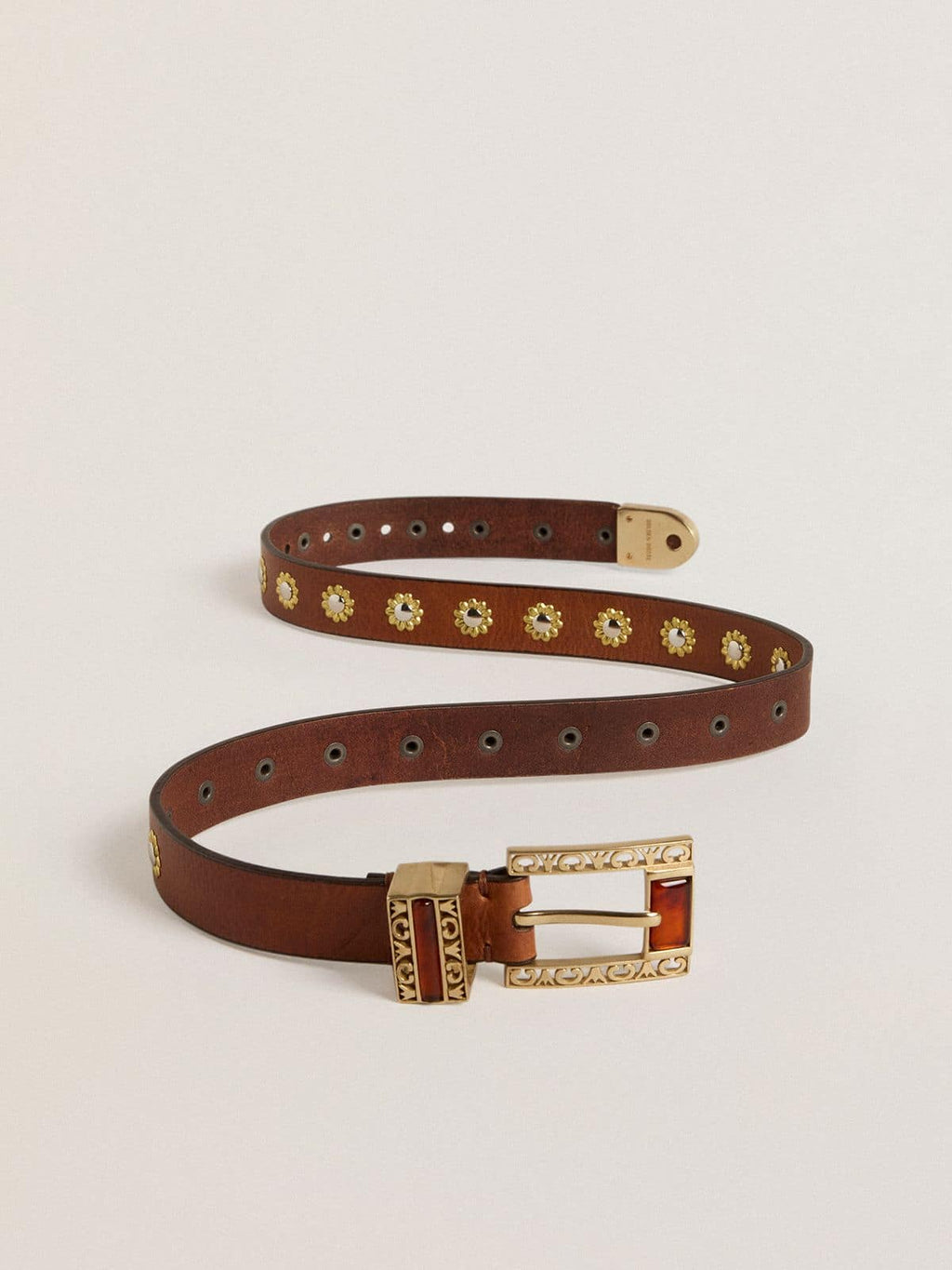 Brown leather belt with golden floral studs and amber inserts
