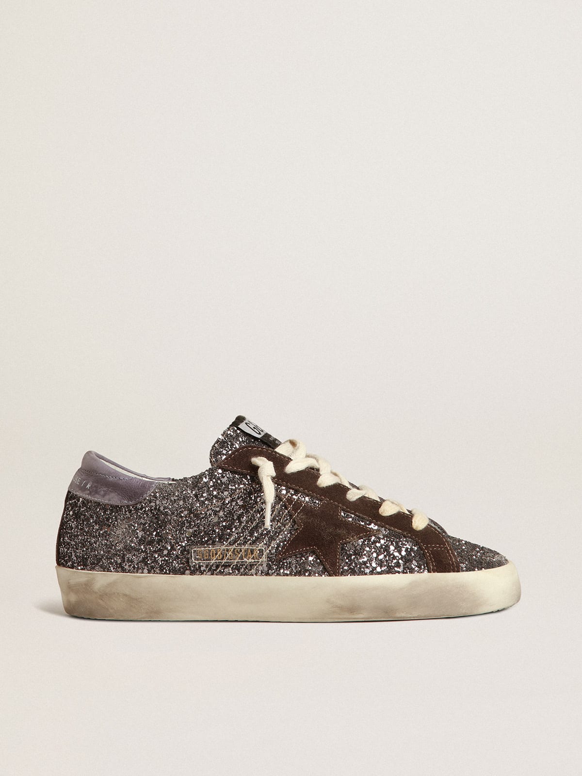 Super-Star in glitter con stella marrone e talloncino lilla