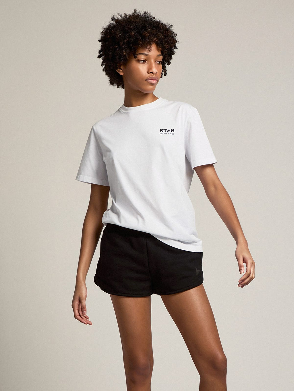 T-shirt bianca donna Collezione Star con logo e stella neri a contrasto