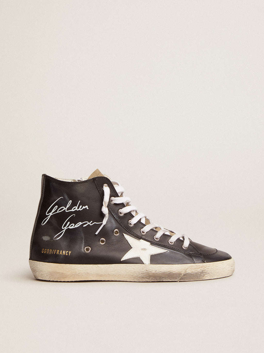 Sneaker Francy con tomaia in pelle nera e stella in pelle bianca