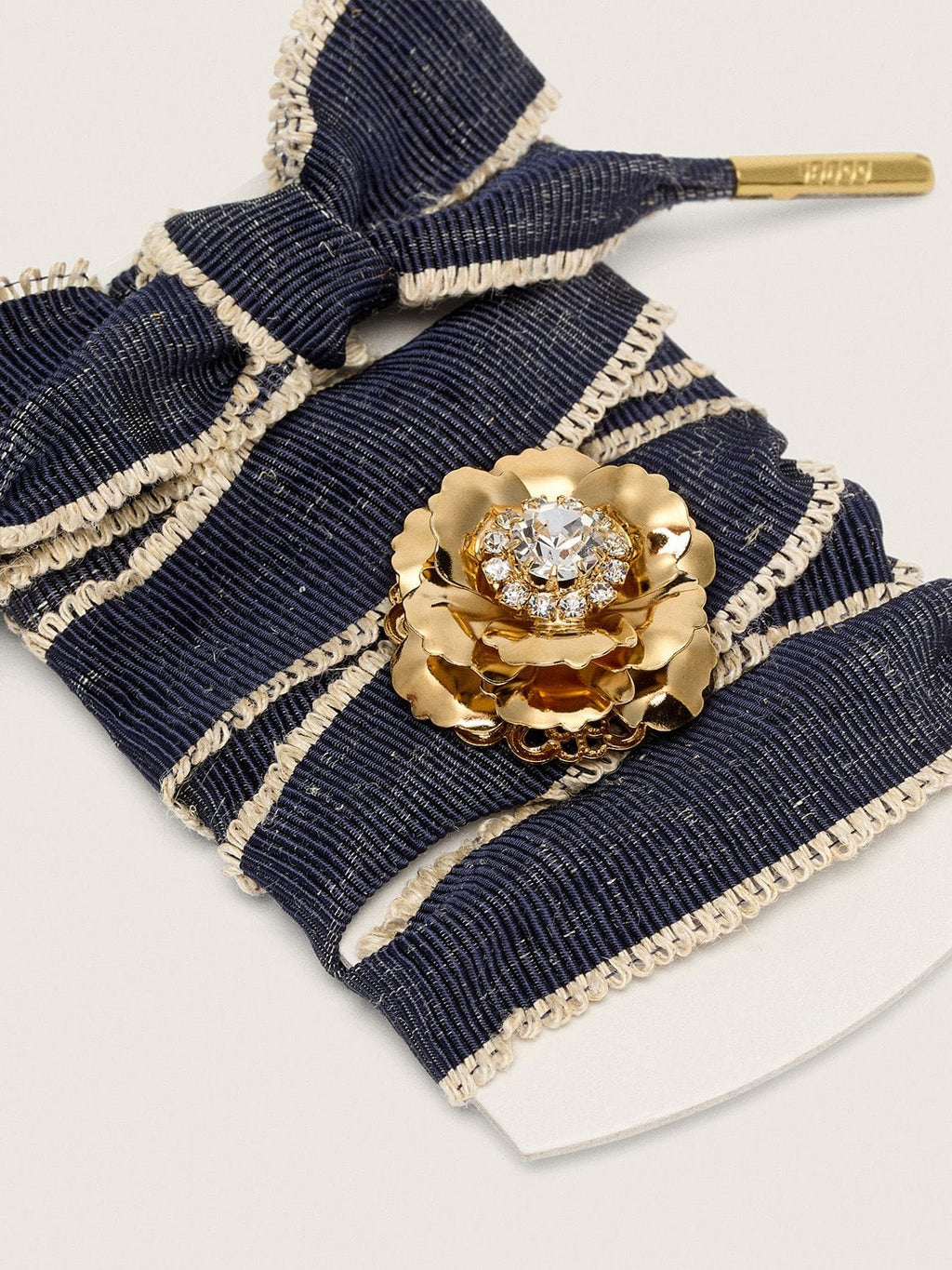 Skins "Sparkling" denim blue laces embellished with beige trim and a golden charm