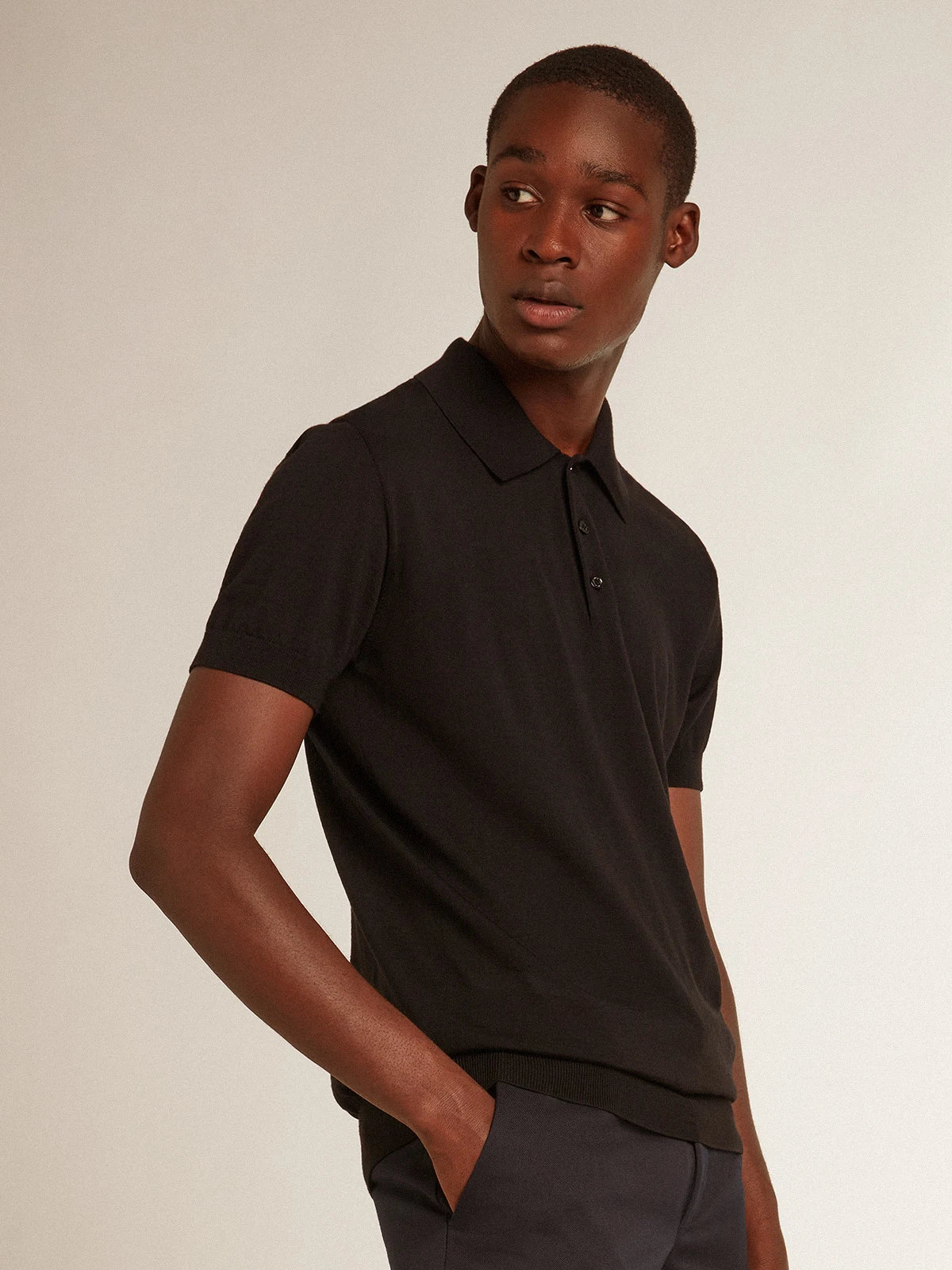 Polo maniche corte da uomo in lana merino di colore nero