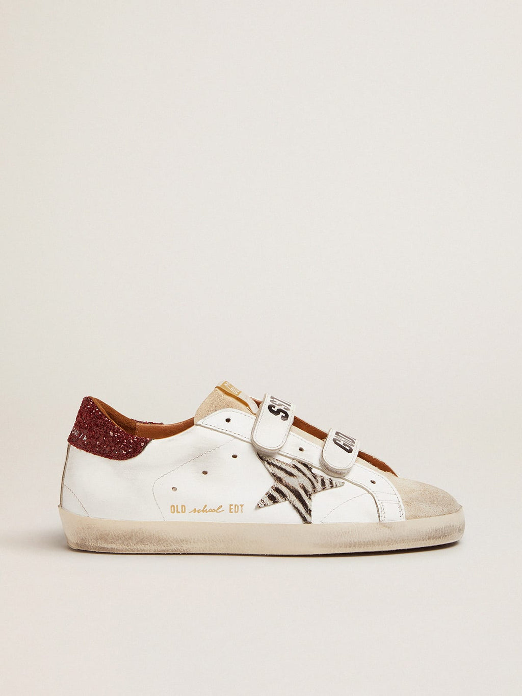 Sneaker Old School con stella in cavallino zebrato e talloncino in glitter rossi