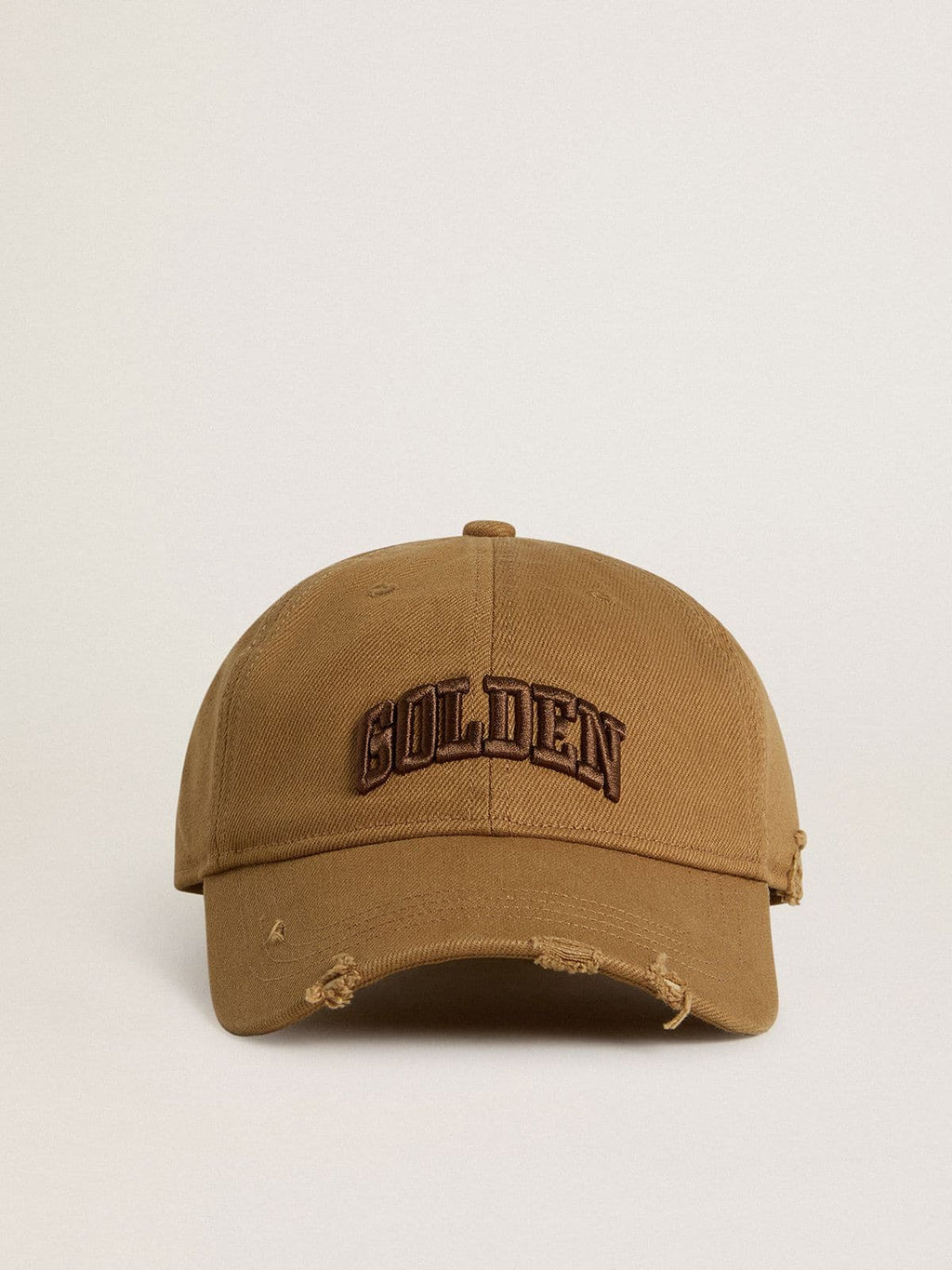 Beige cotton baseball cap with a lived-in finish