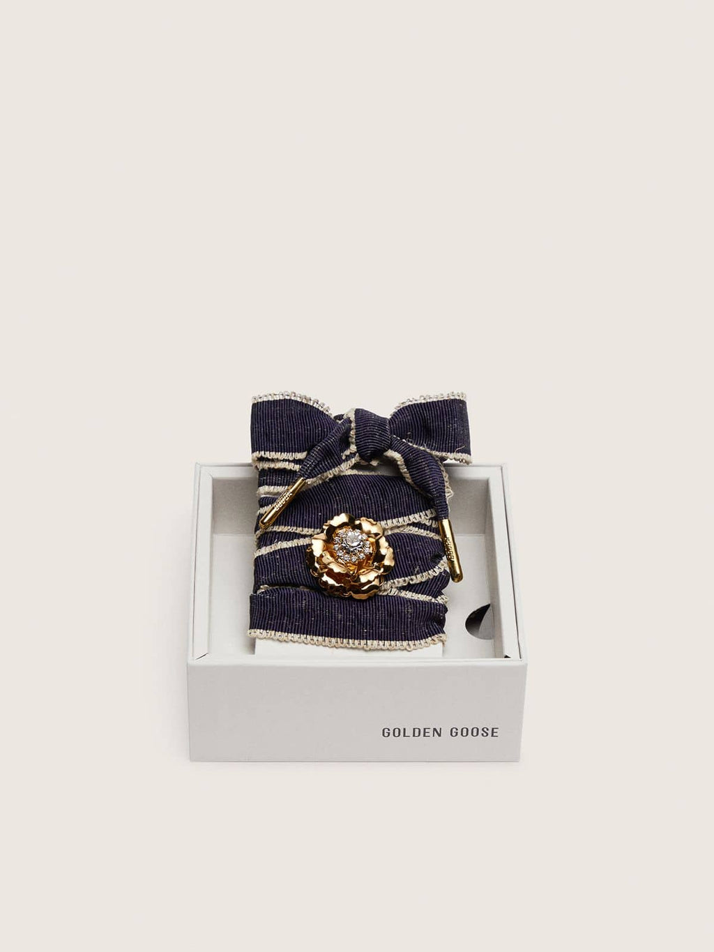 Skins "Sparkling" denim blue laces embellished with beige trim and a golden charm