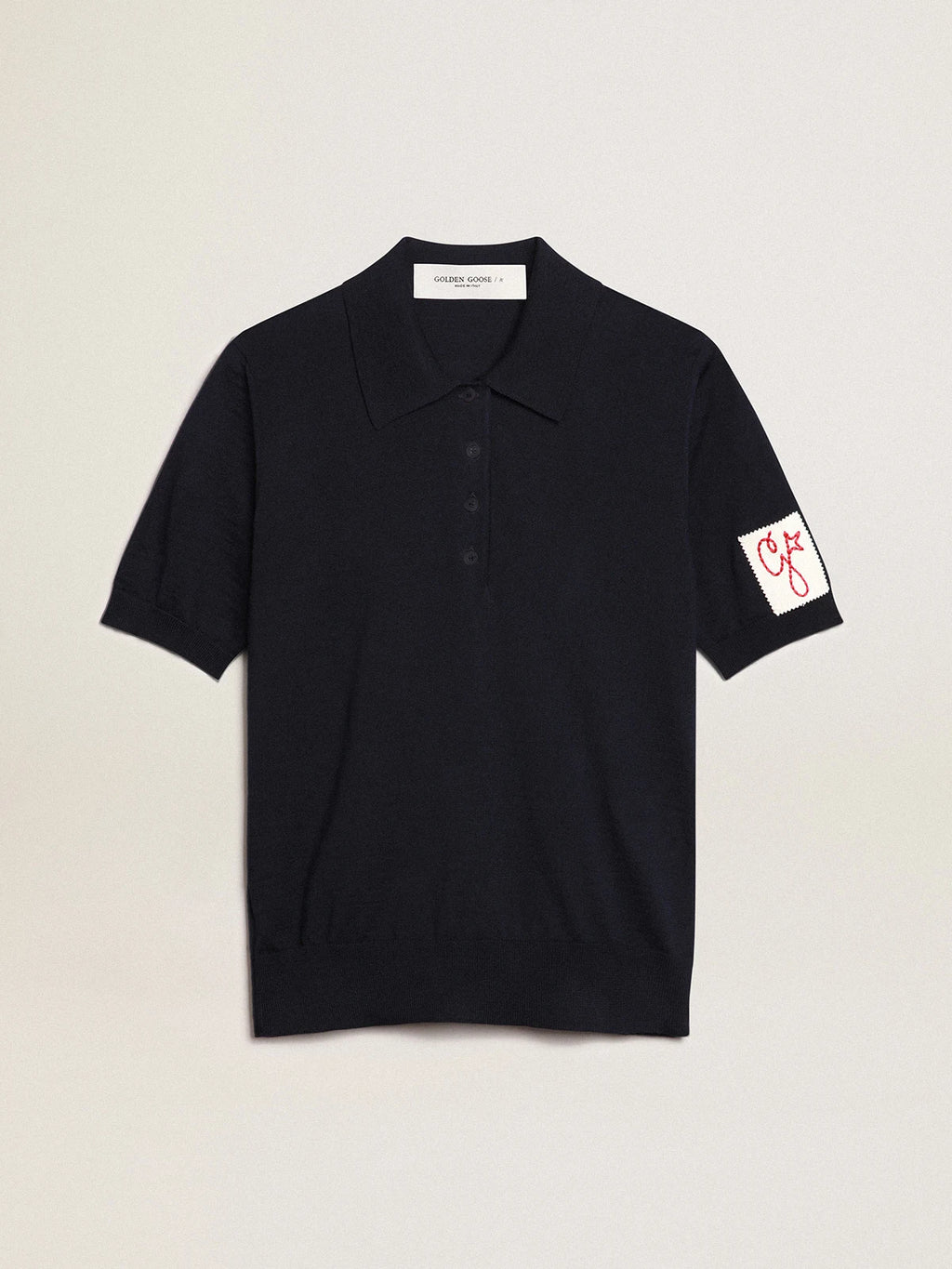 Polo da donna in lana merino di colore blu navy