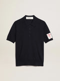 Polo da donna in lana merino di colore blu navy