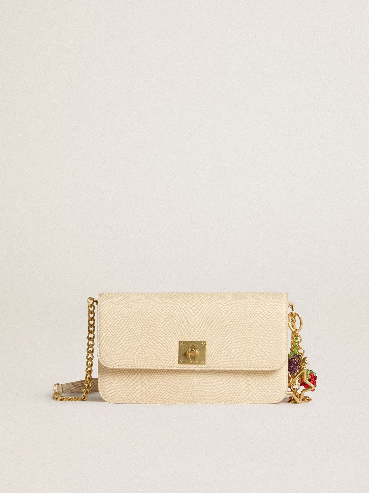 Red strawberry charm with gold star