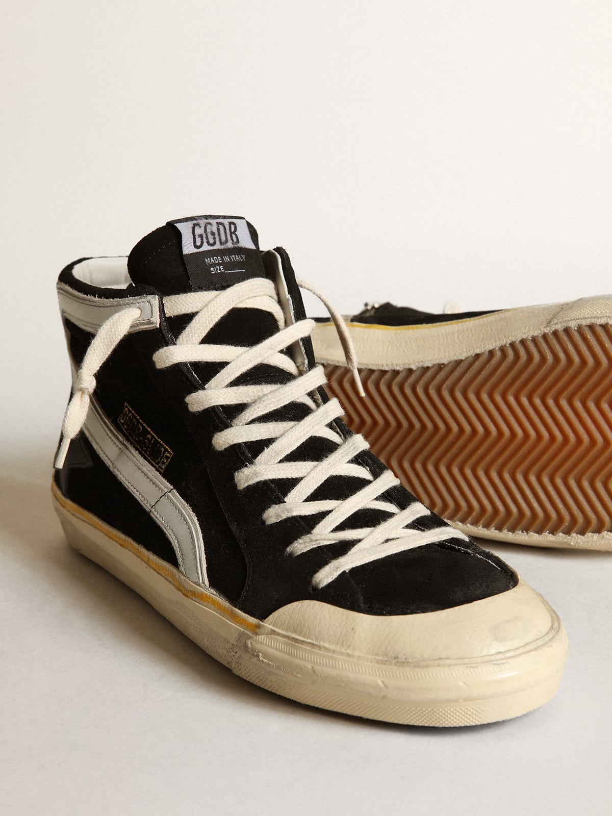 Sneaker Slide Penstar in suede nero con stella in pelle nera e virgola in pelle bianca