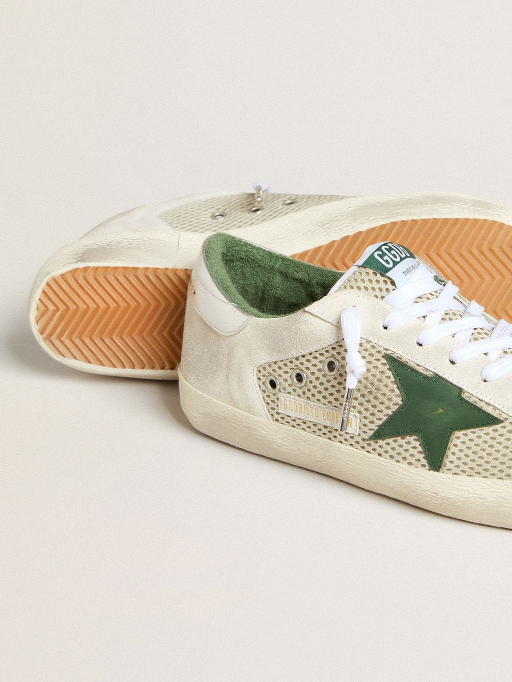 Men’s Super-Star LTD in white suede and mesh with green leather star and silver heel tab