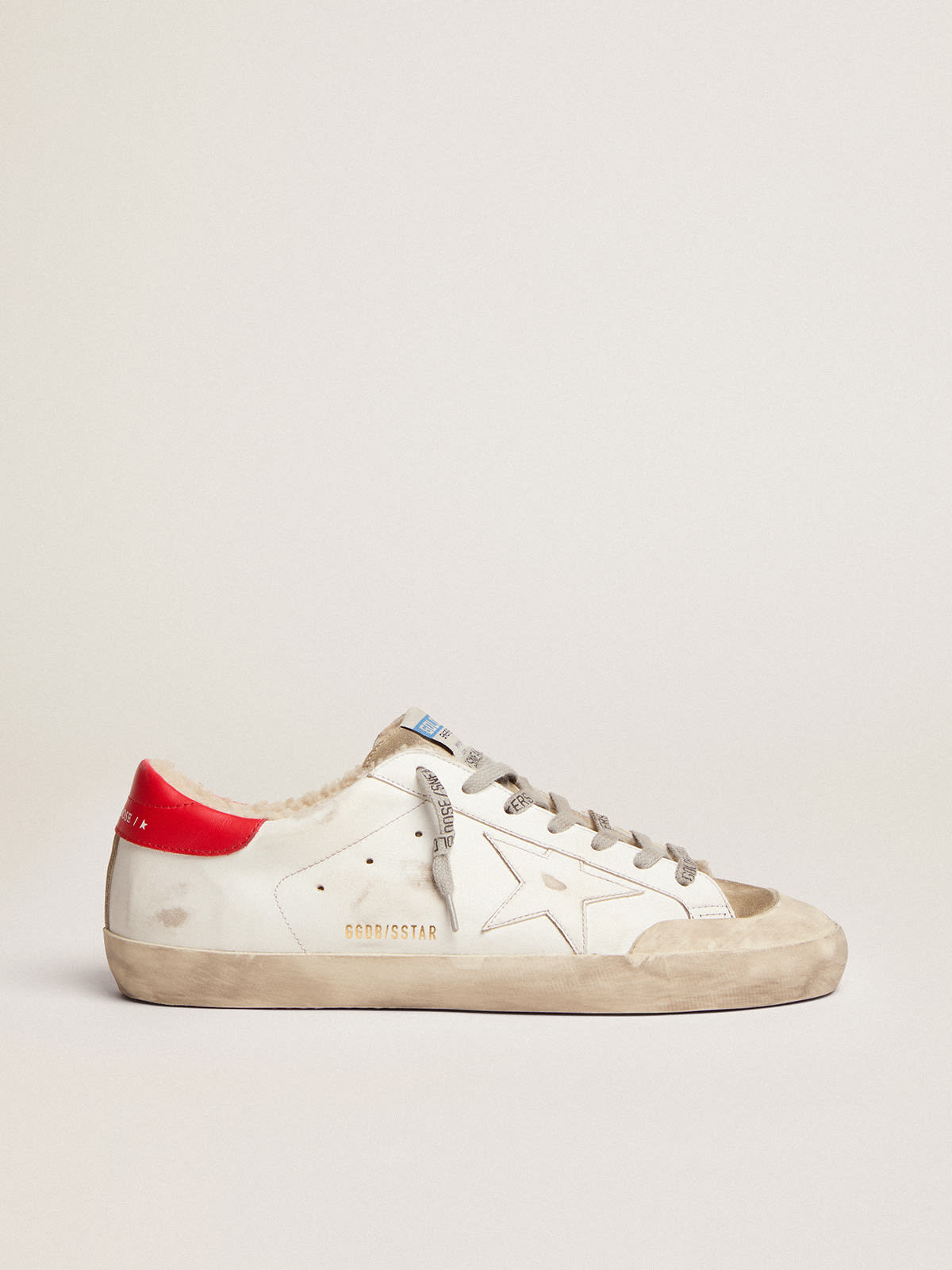 Super-Star con talloncino in pelle rossa e fodera in shearling