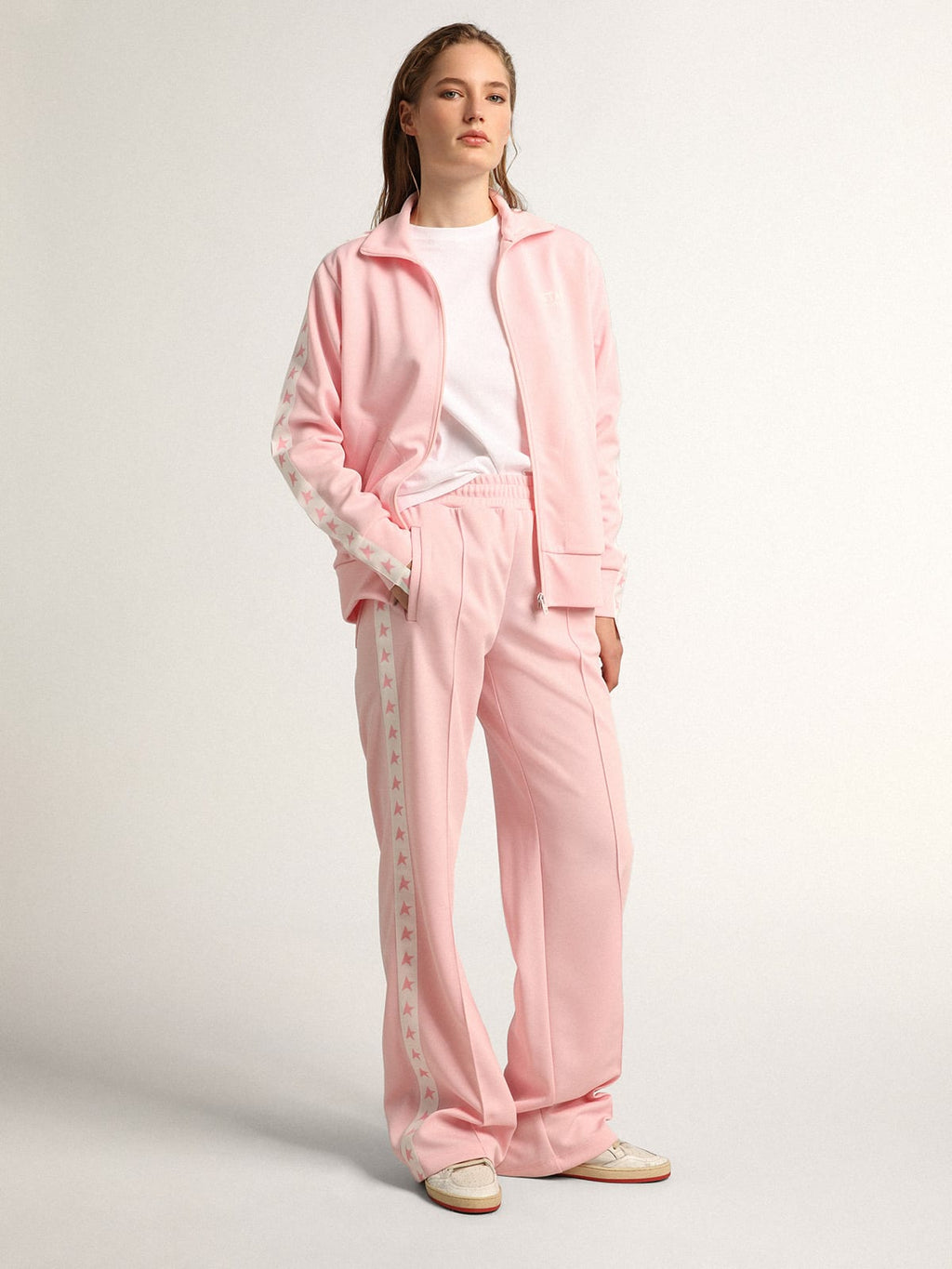 Pantalone jogging da donna di colore rosa con stelle rosa sui lati
